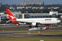 VH-OGO @ YSSY - ready for 16R - by Bill Mallinson