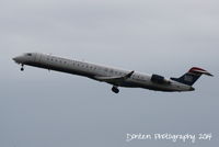 N939LR @ KSRQ - US Air Flight 2805 operated by Mesa (N939LR) departs Sarasota-Bradenton International Airport enroute to Charlotte-Douglas International Airport - by Donten Photography