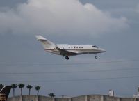 N718HC @ MIA - BAE 800A - by Florida Metal