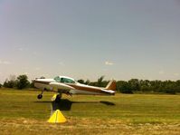 N765EK @ T14 - N765EK winning the spot landing at the Rockin M airport during the Dog Days of Summer '13 fly-in. - by Walt Meziere