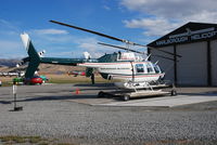 ZK-HJI @ NZOM - ZK-HJI  Marlborough Helicopters outside their hangar at Omaka during the airshow 22.4.11 - by GTF4J2M