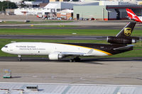 N253UP @ YSSY - taxiing to Cargo Bays - by Bill Mallinson