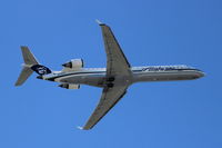 N216AG @ KSEA - Alaska Airlines (SkyWest Airlines). Canadair CL-600-2C10 Regional Jet CRJ-700. N216AG cn 10023. Seattle Tacoma - International (SEA KSEA). Image © Brian McBride. 31 March 2013 - by Brian McBride