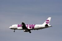 TF-WOW @ EKCH - TF-WOW about to land on rw 22L - by Erik Oxtorp