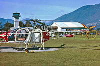 HB-XGG @ LSZL - HB-XGG   Sud Aviation SA.315B Lama [2453] (Eliticino) Locarno~HB 27/09/1984. Taken from a slide. - by Ray Barber