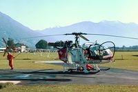 HB-XGG @ LSZL - HB-XGG   Sud Aviation SA.315B Lama [2453] (Eliticino) Locarno~HB 27/09/1984. Taken from a slide. - by Ray Barber