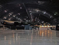 56-0665 @ KFFO - The huge aircraft must be displayed at an angle; even then, the wings extend to the sides of the enormous hangar. - by Daniel L. Berek