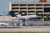 N900MF @ MIA - Falcon 900 - by Florida Metal