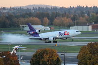 N302FE @ KPDX - FedEx Express. DC-10-30F. N302FE cn 46801 103. Portland - International (PDX KPDX). Image © Brian McBride. 22 October 2013 - by Brian McBride
