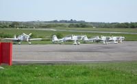 G-CIBM @ EGFH - Line up of Team Raven aircraft. Vans RV-8's G-CDPJ, G-CIBM, G-EGRV, G-VFDS and Vans RV-4 G-MAXV. The formation aerobatic display team went on to gain Public Display Authorisation on 7th May 2014. - by Roger Winser