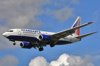 EI-ETX @ EGLL - Approach 27L - by John Coates