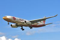B-6075 @ EGLL - Approach 27L - by John Coates