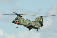 04076 @ ESDF - Hkp4B helicopter of the Swedish Defense Helicopter Fleet flying over Ronneby Air Base during a SAR demo, 2004.