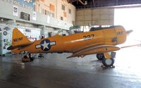 N211RF @ KHYI - 1957 NORTH AMERICAN AT-6C IN HANGER AT SAN MARCOS - by dennisheal