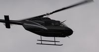 N105JD @ KBEH - Checking electrical lines around South West Michigan - by Mark Parren  269-429-4088