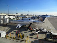 N752SK @ KLAX - United Express (SkyWest Airlines). Canadair CL-600-2C10 Regional Jet CRJ-700. N752SK cn 10209. Los Angeles - International (LAX KLAX). Image © Brian McBride. 16 January 2014 - by Brian McBride