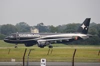 LY-COM @ EGKK - Taxiing to depart - by John Coates