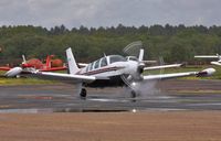 N1136Y @ EGHH - Damp departure - by John Coates
