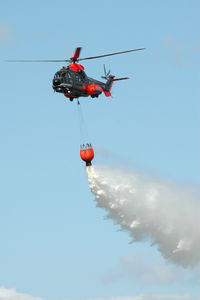 10405 @ ESDF - Hkp10 helicopter of the Swedish Defense Helicopter Fleet  in a firefighting demonstration at Ronneby Air Base. - by Henk van Capelle