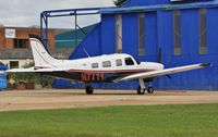 N77YY @ EGHH - Waiting to enter paintshop - by John Coates
