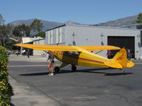 N87804 @ SZP - 1946 Piper PA-12 SUPER CRUISER, Lycoming O-290 125 Hp upgrade, Alaska visitor flown by young lady pilot spotting to refuel - by Doug Robertson