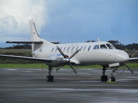 ZK-CIC @ NZAA - Outside air freight hangar - by magnaman