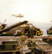 XT458 - Westland Wessex, XT458 coded 'J' of 845 NAS pictured on HMS Hermes during deployment to Exercise Deep Express in September 1975. Note USN Seaking from USS John F Kennedy in rear. Picture taken on an old 'Instamatic' camera. - by Clive Pattle