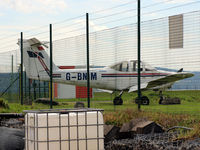 G-BNIM @ EGPN - Tomahawk G-BNIM awaits its fate in the aircraft cemetary at Dundee Riverside EGPN - by Clive Pattle