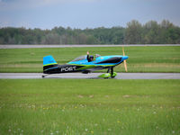 N16MR @ YNG - Saluting the crowd after performing @ the Youngstown Airshow - by Arthur Tanyel
