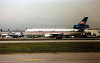 YU-AMA @ KLAX - KLAX - Yugo DC-10-30 arriving KLAX on 25L and crossing 25R for the Intl terminal. - by Tom Vance