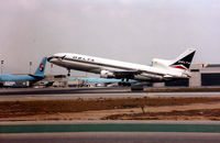 N723DA @ KLAX - KLAX N723DA rotating off 25R for KATL. - by Tom Vance