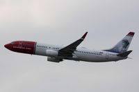 LN-DYL @ EGKK - Seen pulling out from runway 26R at EGKK. - by Derek Flewin