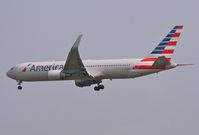 N348AN @ EGLL - Arriving 27L - by John Coates
