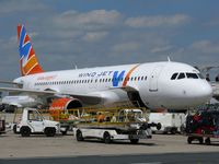 EI-DNP @ LFPG - ex WINDJET at CDG T3 - by Jean Goubet-FRENCHSKY