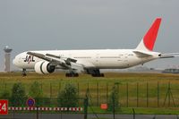 JA735J @ LFPG - Boeing 777-346ER, reverse thrust landing rwy 26L, Roissy Charles De Gaulle Airport (LFPG-CDG) - by Yves-Q