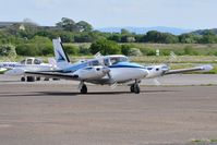 N25PR @ EGFH - Visiting Twin Comanche B. - by Roger Winser