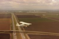 N5248Z - 48Z over I80 near Sacramento. Flight was to deliver her to its new owner. This was in late 1986.