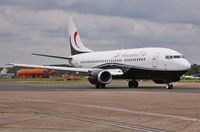 9H-MTF @ EGHH - Taxiing to depart with new titles Les Ambassadeurs Club - by John Coates
