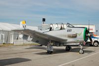 N661NA @ LAL - 1957 North American T-28C, N661NA, at 2014 Sun n Fun, Lakeland Linder Regional Airport, Lakeland, FL - by scotch-canadian