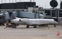 N14959 @ KORD - EMB-145LR - by Mark Pasqualino