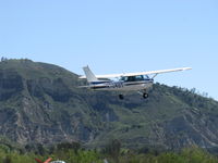N704UT @ SZP - 1976 Cessna 150M, Continental O-200 100 Hp, takeoff climb Rwy 22 - by Doug Robertson
