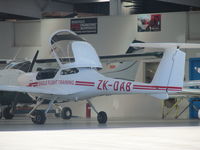 ZK-DAB @ NZAR - In Hawker Pacific hangar.
Normally on other side of airfield with flight training centre. - by magnaman