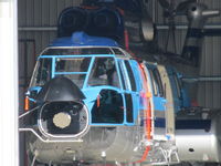 ZK-HHL @ NZAR - Not a R44 but a super puma c/n 2240. It has flown but I have only seen it in the hangar. At least the sun caught it today. - by magnaman