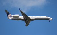 N14198 @ MCO - United Express E145XR - by Florida Metal
