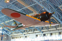 43-188 @ RJNH - On display at JASDF Hamamatsu Kohokan. This Zero was flown by Lt. Shinya Ozaki of 343 Kokutai, who shot down a F6F of VF-10 on 19.06.44 during the Great Marianas Turkey Shoot, but in turn was hit and died on forced landing at Guam. - by Arjun Sarup