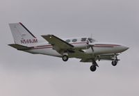 N569JM @ EGHH - Arriving in drizzle - by John Coates