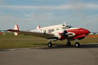 N90TT @ LAL - 1957 Beech E18S, N90TT, at 2014 Sun n Fun, Lakeland Linder Regional Airport, Lakeland, FL - by scotch-canadian