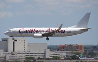 9Y-SXM @ MIA - Caribbean 737-800 - by Florida Metal