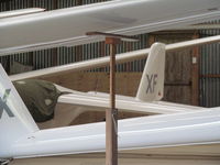 ZK-GXF - in crowded hangar!! at drury - by magnaman