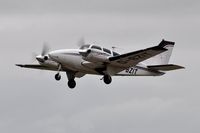 G-BZIT @ EGFH - Visiting Beech Baron operated by Propellerhead Aviation departing Runway 22. Previously registered HB-GBS. - by Roger Winser
